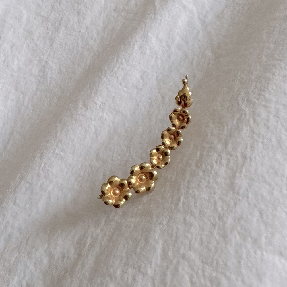 Gold flower ear climber